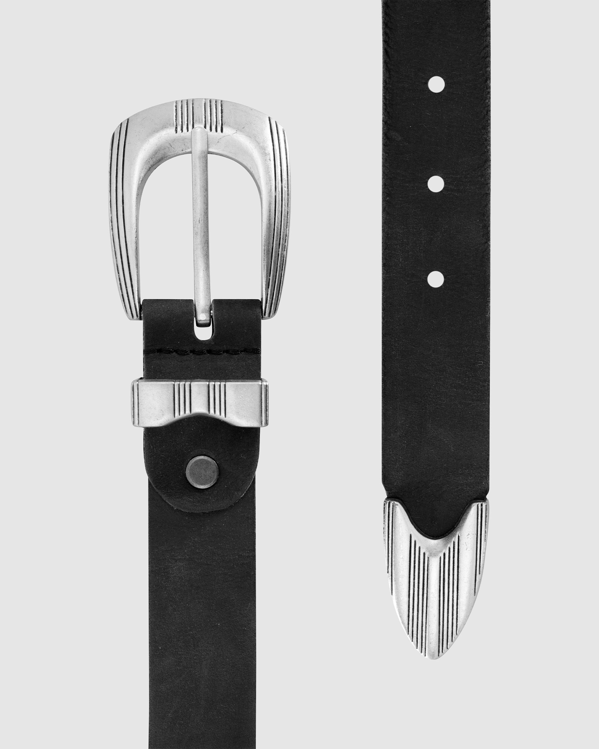 Black leather belt with silver buckle on a light gray background