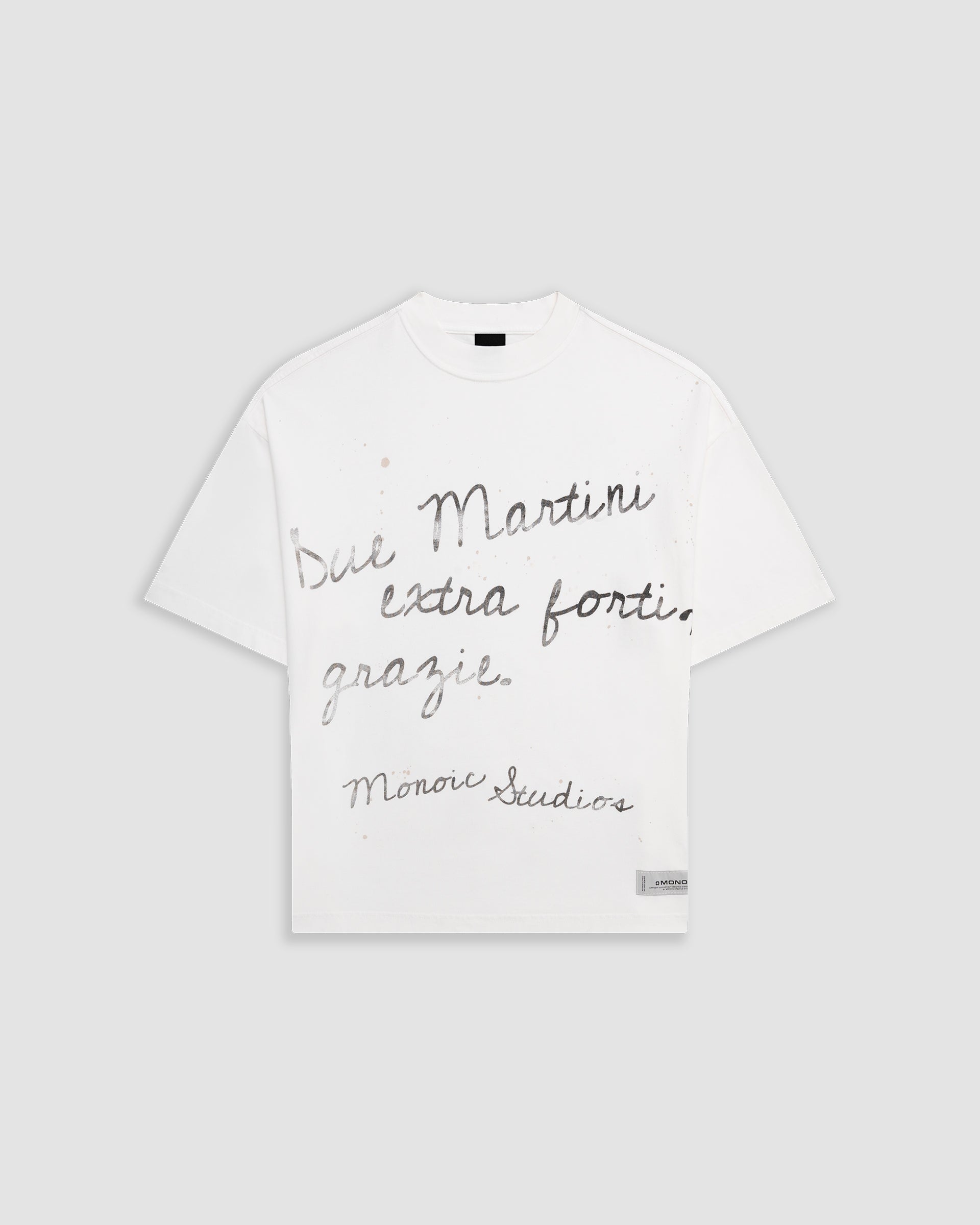 Egret White Boxy Fit T-Shirt with distressed screen-print and coffee-splatter effect, featuring woven Monoic side label.