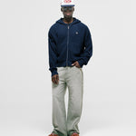 Zip Knitwear Hoodie in Navy Blue with metallic monogram, kangaroo pocket, and double zipper.